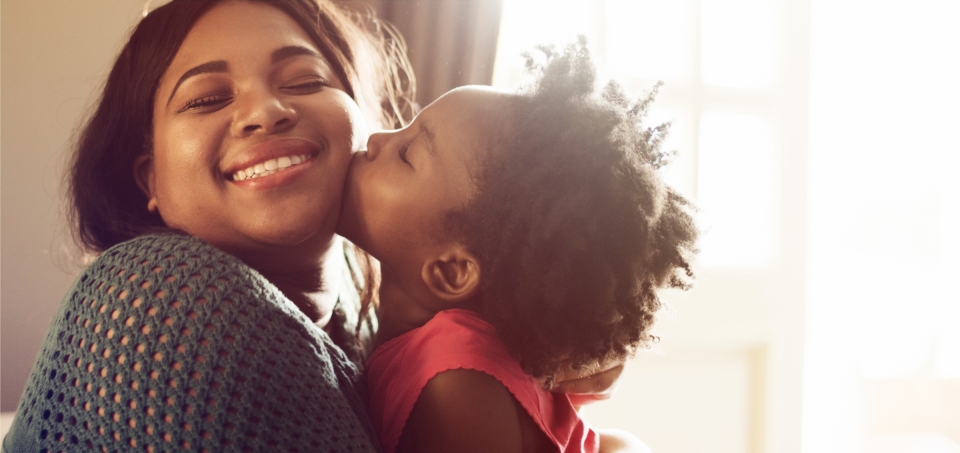 Mother and Daughter Hugging