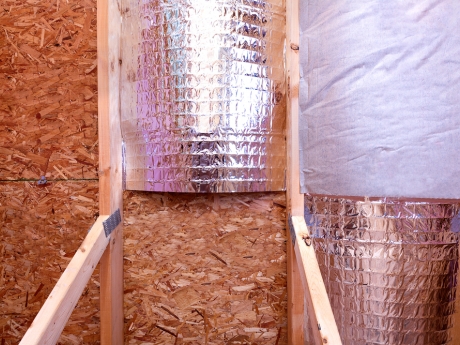 radiant barrier partially installed in attic of house