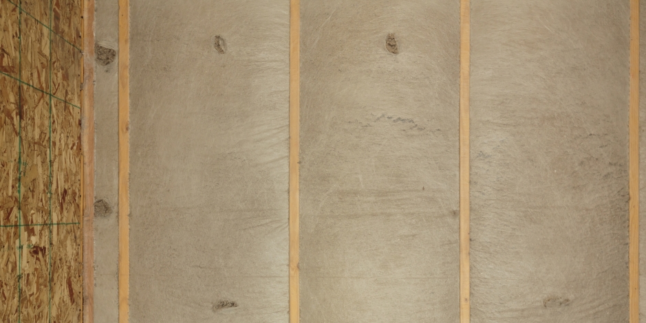 brown blown-in fiberglass insulation in attic brown blown-in fiberglass insulation in attic